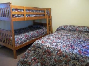 Separate Back Bedroom Has 1 Double Bed & 2 Bunk Beds